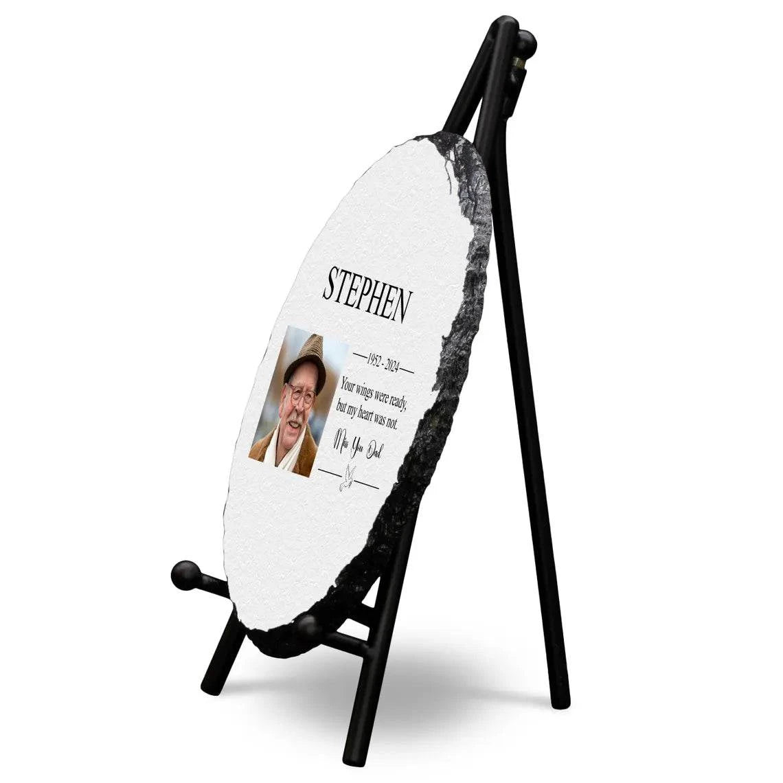 Round personalised memorial slate with glossy finish, featuring a full-color photo and text, displayed on a stand.