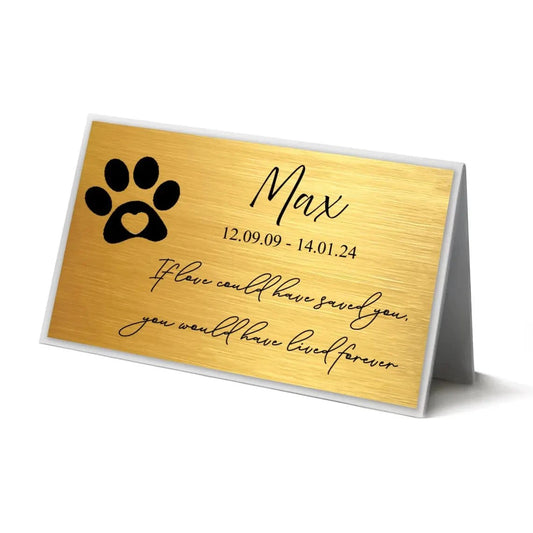 Personalized memorial plaque with pet paw print, engraved with name, dates, and heartfelt message; durable metal suitable for outdoor use.